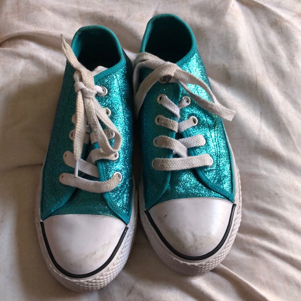 Blue sparkly Jojo shoes they are sneakers.